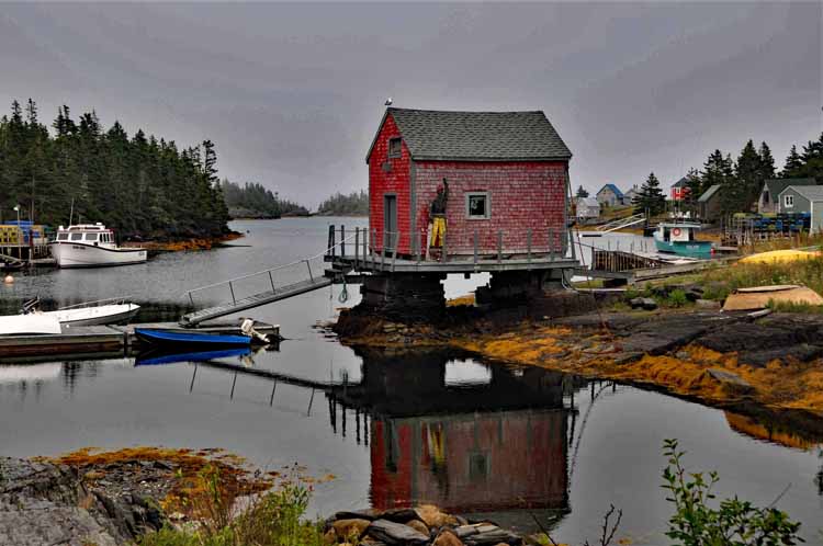 red shack on water